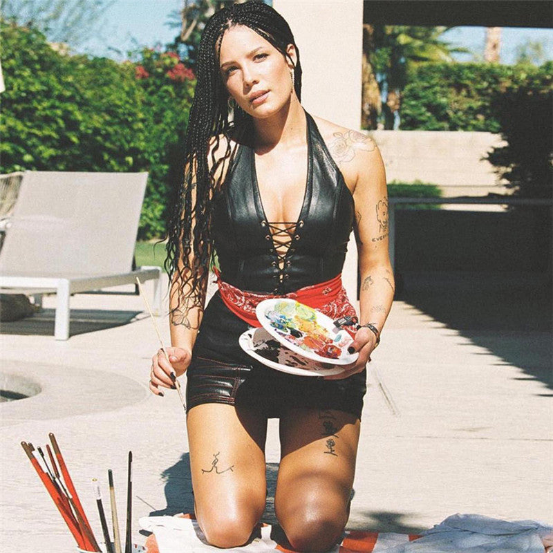 Open-back PU top with exposed cleavage