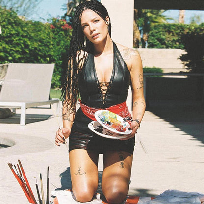 Open-back PU top with exposed cleavage